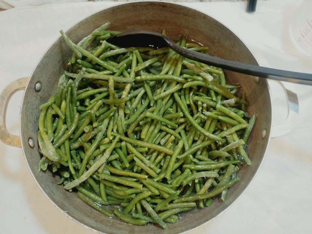 Green bean casserole is a casserole consisting mostly of cooked green beans, cream of mushroom soup, and French fried onions