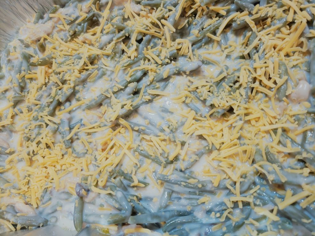 Green bean casserole is a casserole consisting mostly of cooked green beans, cream of mushroom soup, and French fried onions