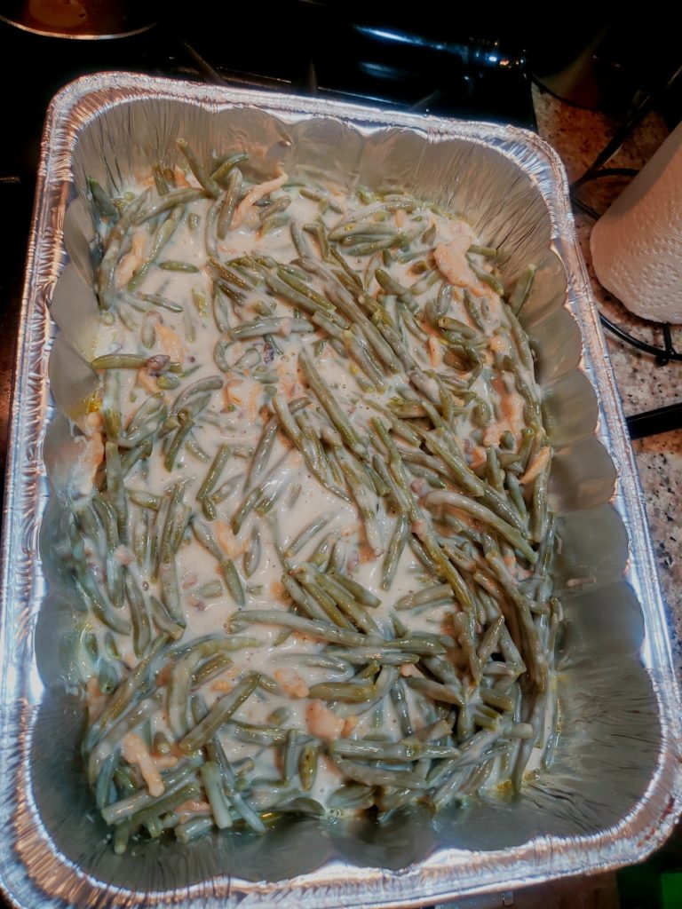 Green bean casserole is a casserole consisting mostly of cooked green beans, cream of mushroom soup, and French fried onions