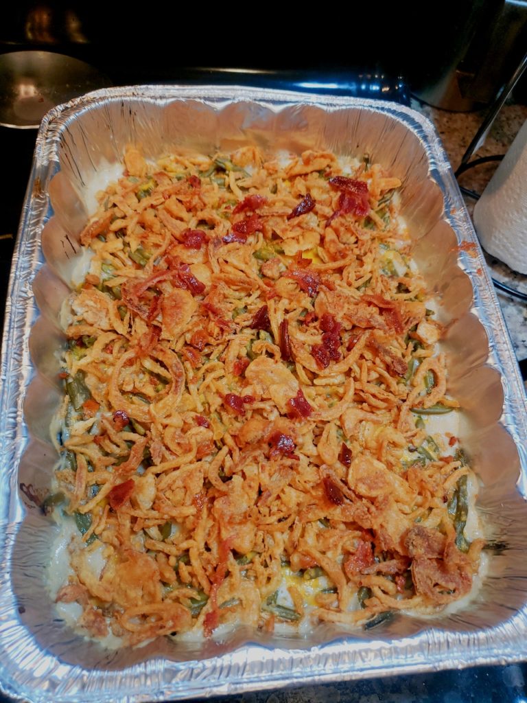 Green bean casserole is a casserole consisting mostly of cooked green beans, cream of mushroom soup, and French fried onions